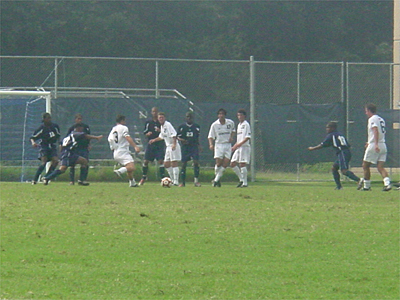The Bison and the Hoyas fight for the ball.