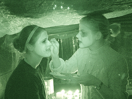 Two students apply Halloween face paint...one even had the sniffles!  

And yes, we heard!   