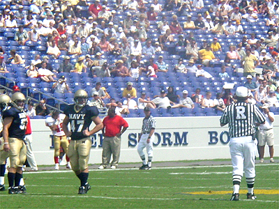 The referee's try to make a fair decision on a tough play.