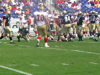 Fumble!! The players watch to see which team will come up with the ball.