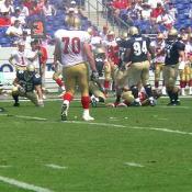 Fumble!! The players watch to see which team will come up with the ball.