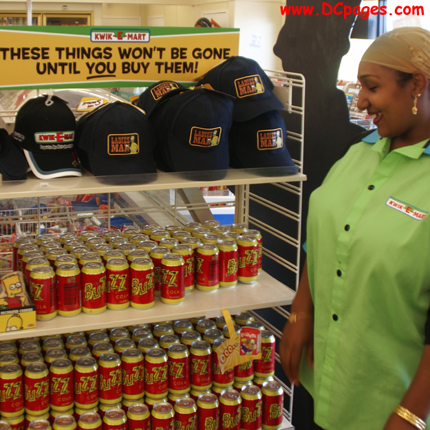 KWIK-E-MART employee admires the Simpson product line. I bought the hat.