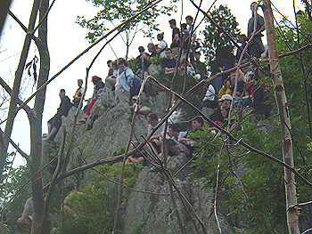 Spectators watching the action that is happening down below.
