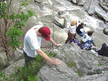 To get better shots of the competition we had to climb down the perilous rocks.