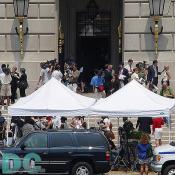 People begin entering Mellon Auditorium to listen to the 9-11 Commission Final Report.