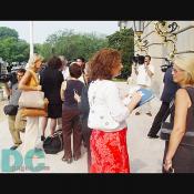 News reporters interview Family members of 9-11 victim.