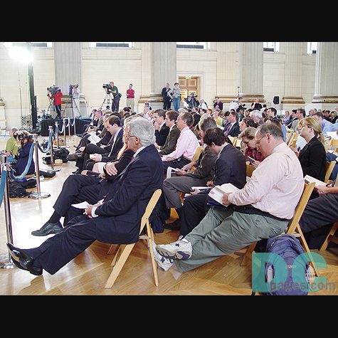 Members of the media listen to the 9-11 Commissioners.