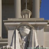 This marble sphinx guard is located at the main entrance.