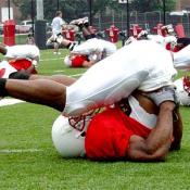 Before practice begins, the entire team does calisthenics.