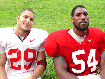 # 29, Sammy Maldonado and #54, Scott Smith, relax after a hard practice.