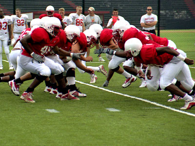 Defense completes their individual practice before scrimmaging begins.
