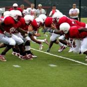Defense completes their individual practice before scrimmaging begins.