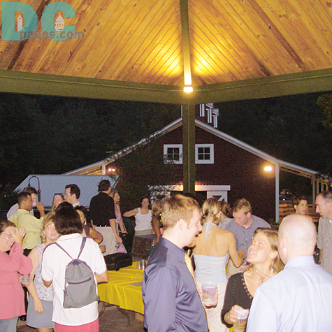 People were hanging out and having fun at a hot & muggy night. 