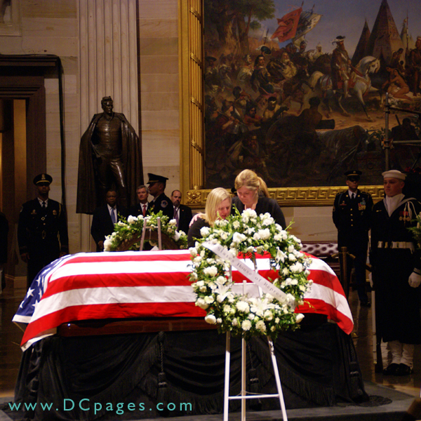 Two of President Ford's grandchildren shed tears in front of his honored casket.