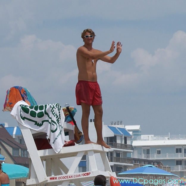 Ocean City - The life guards in Ocean City use hand signals like this to communicate with each other up and down the beach.