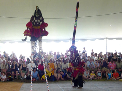 The Dogon dancers wearing masks representing ancestry and courage