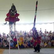The Dogon dancers wearing masks representing ancestry and courage