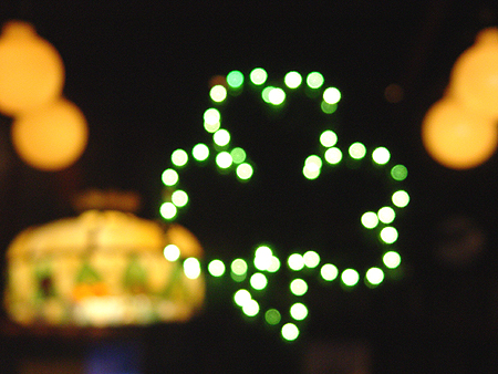 The Shamrock lights seemed a tad blurred looking through bottom of empty glass. Time to get another Guiness.