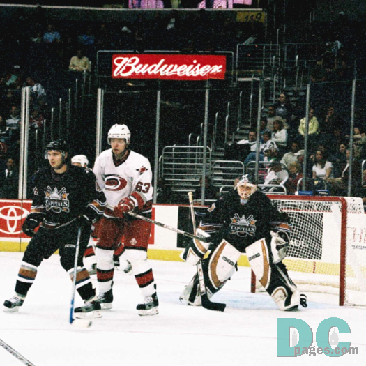 'Canes forward Josef Vasicek gets position on Steve Eminger.