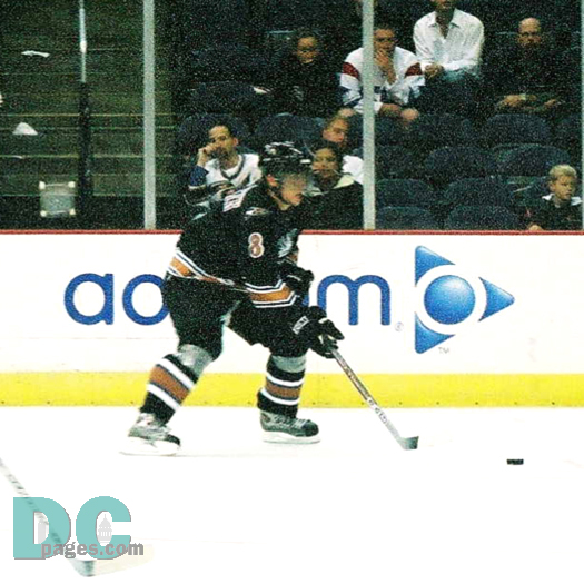 Alex Ovechkin takes the puck on the half wall.