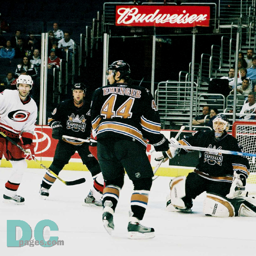 Eminger and Witt protect Olie Kolzig.