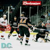 Eminger and Witt protect Olie Kolzig.