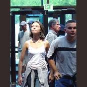 A tourist looks in awe as she enters the great lobby of spectacle.