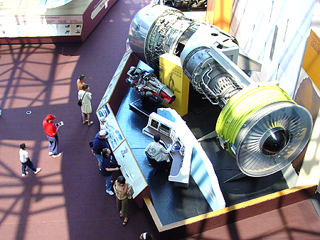Looking down at an exposed turbo fan jet engine.