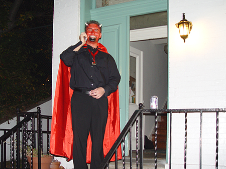Even the prince of darkness communicates by cell phone.