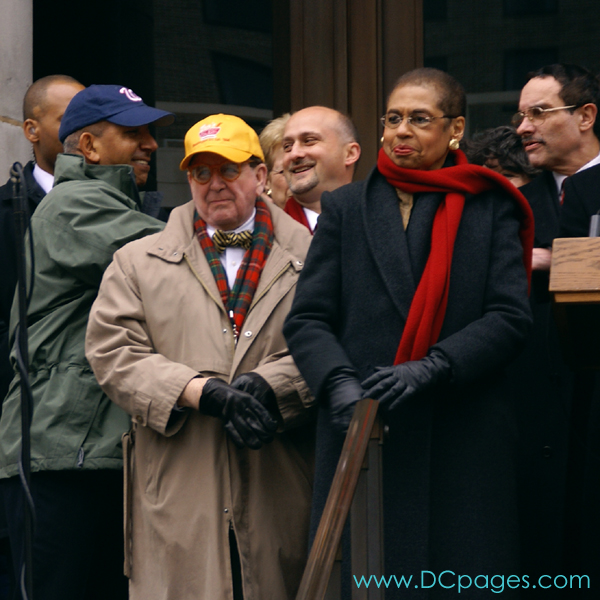 The Honorable Anthony A. Williams greets DC Vote Executive Director, Ilir Zherka, and DC Council Chair Vincent Grey. Congresswoman Eleanor Holmes Norton looks out to a growing crowd.