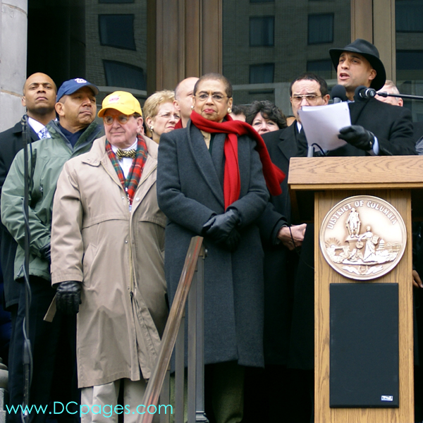 Civic leaders of the District of Columbia listen to the speech given by Mayor Adrian M. Fenty. "WE ARE NOT TRULY FREE!"