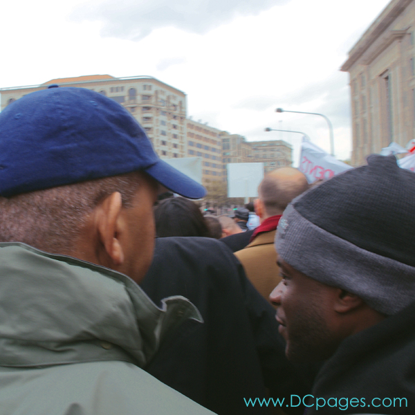 Former Mayor Anthony Williams speaks to a District Youth about the historical signicance in participating in the DC Voting Rights March.