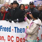 A young District resident shows her appreciation to DC Congresswoman Norton for demanding Congressional Voting Rights for DC.