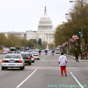 DC Police escorts marchers on Pennslyvania avenue.