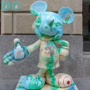 'Celebrate Mickey: 75 InspEARations' Statue - UndercovEAR Mickey - "UndercovEAR Mickey," Jennifer Garner's statue reflects the secret agent theme of her hit television show Alias. 