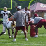 Offensive Line practices some hitting drills.