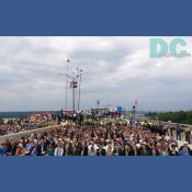 North to South view of the Woodrow Wilson bridge. The attending audience of the bridge dedication watch the draw span rise.