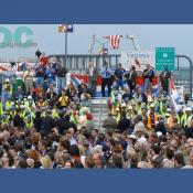 North to South view of the Woodrow Wilson bridge. honored workers of the bridge dedication wearing their construction uniforms.