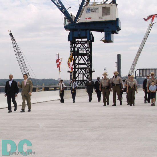 The District of Columbia's Mayor Anthony Williams and Governor Erlich walk South to meet the Secretary of Transportation and Governor of Virginia.