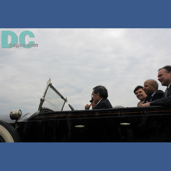 In the front seat of Woodrow Wilson's Presidential limousine 'The Silver Ghost' is U.S. Secretary of Transportation  Norman Y. Mineta (foreground). In the backseat is  Maryland Governor Robert L. Ehrlich, Mayor Anothony Williams, and Virginia Governor Timothy M. Kaine.