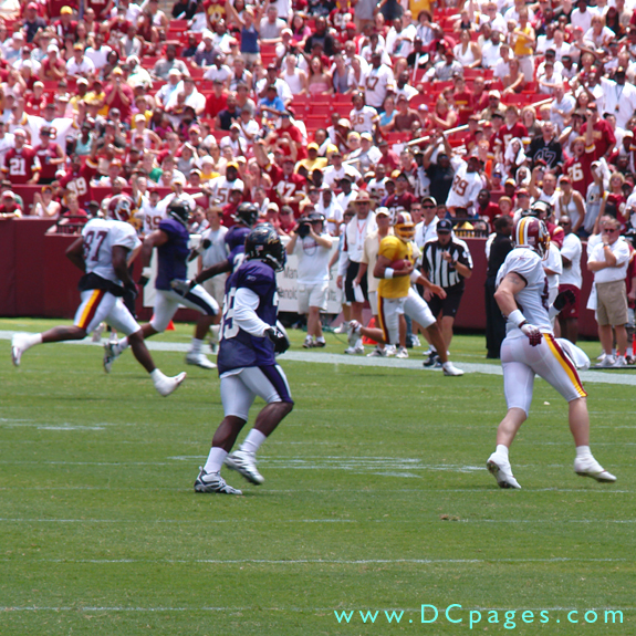 Quarterback runs the ball for a major gain.