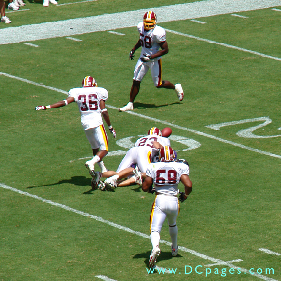 Redskins defense put a 'Capitol Hurt' on a Raven receiver. The ball gets caughed up.