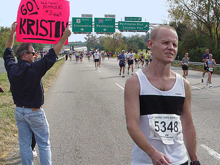 Many people held up signs to encourage the runners.