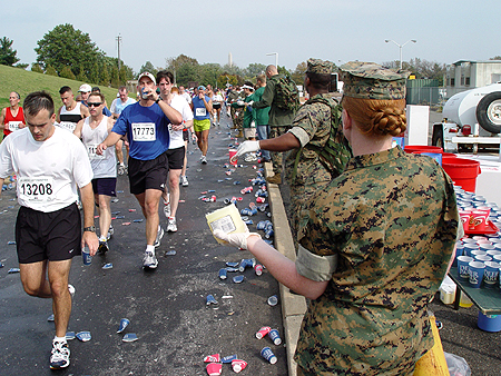 Many Marines helped pass out water to the runners of the 5K and the Marathon.