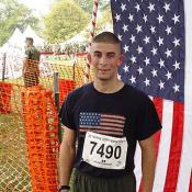 After completing the race, this Virginia resident looks for a place to rest his tired legs.