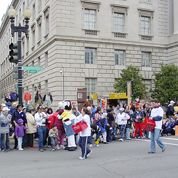 2003 Cherry Blossom Festival: Happy spectators line Constitution Avenue in anticipation of the parade.   