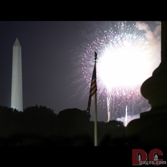 Eagle on top American flag during
burst.