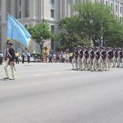 Colonial soldiers marching by