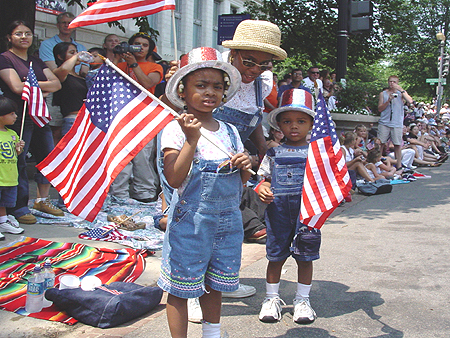 Children displaying their patriotic colors