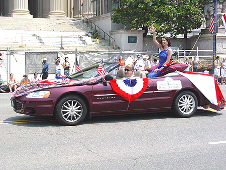 The woman in the back of the car is beautiful Miss DC, Lisa Ferris